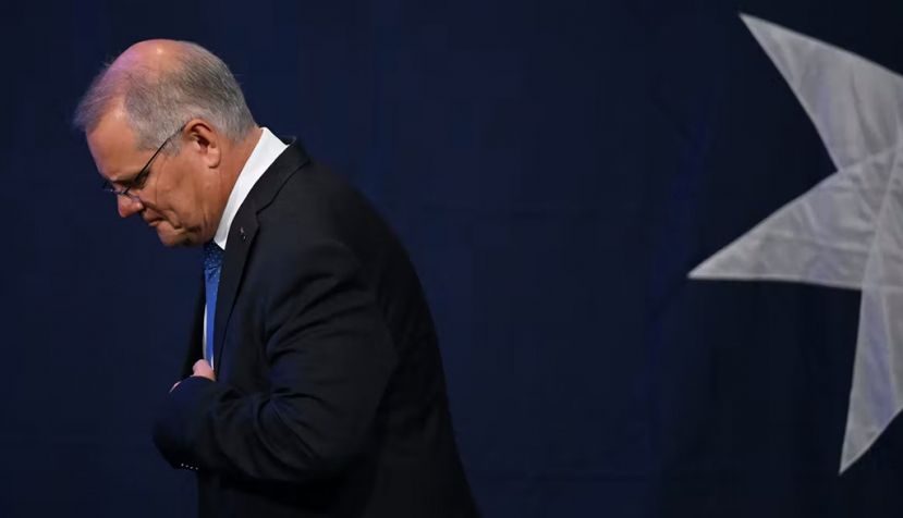 Scott Morrison exists stage right after losing the Australian election. EPA/Dean Lewins