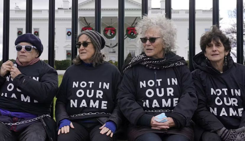  Activists with Jewish Voice for Peace gather to protest the Israel-Hamas war in Gaza and chain themselves to the fence outside the White House on Dec. 11, 2023. AP Photo/Susan Walsh