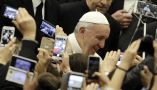 Pope Francis arrives for his weekly general audience at the Vatican on Feb. 15, 2017. AP Photo/Gregorio Borgia