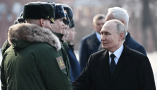 Russian President Vladimir Putin attends a wreath-laying ceremony at the Tomb of the Unknown Soldier in Moscow on Feb. 23, 2025. Sergei Bobylyov/AFP via Getty Images