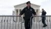 Police place a fence at the U.S. Supreme Court on Feb. 8, 2024, before justices heard arguments over whether Donald Trump is ineligible for the 2024 ballot. AP Photo/Jose Luis Magana