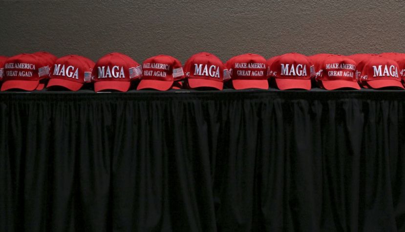 MAGA hats are placed on a table at an election night party in West Palm Beach, Fla., on Nov. 5, 2024. Ricky Carioti/The Washington Post via Getty Images