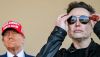 Elon Musk, right, has moved to take the reins of the U.S. government. Brandon Bell/Getty Images